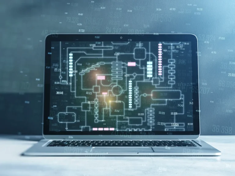 Laptop mit digitalem Schaltkreisdesign im Hintergrund.